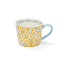 Mug with yellow and white daisy design, soft blue handle and ‘If you were a flower, I would pick you’ message inside.