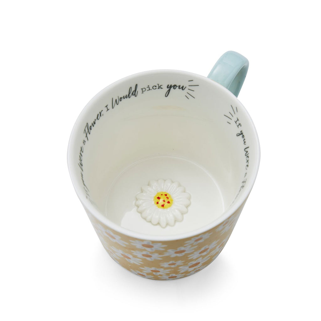 Mug with yellow and white daisy design, soft blue handle and ‘If you were a flower, I would pick you’ message inside.