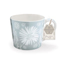 Soft grey-blue mug with large white floral design and delicate daisy motifs.