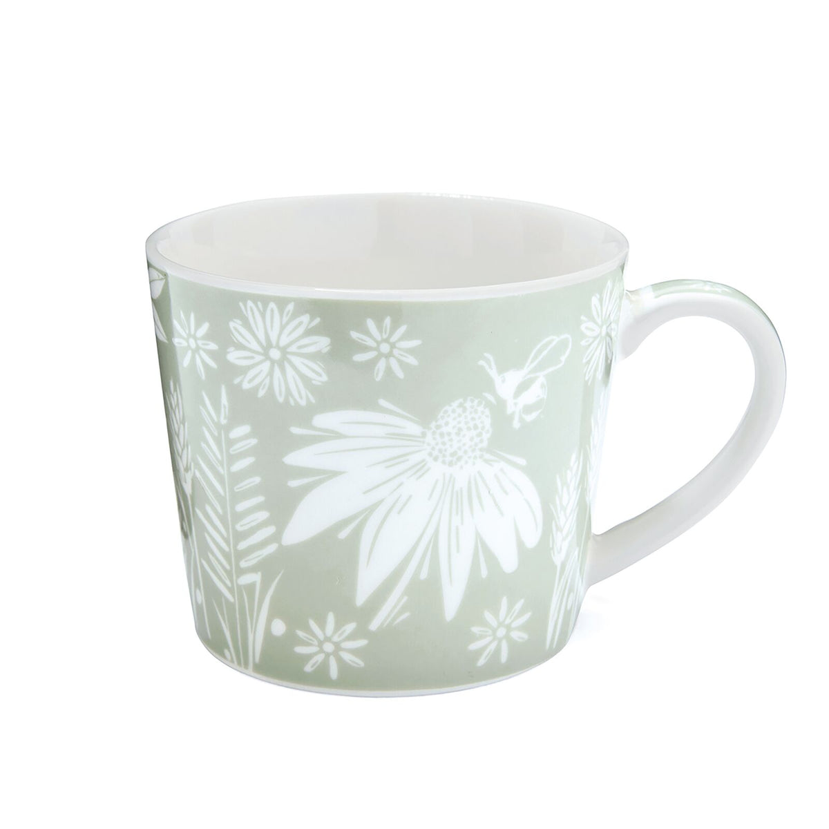 Sage-green mug with white floral and botanical pattern, featuring an oversized flower motif and tapered shape.