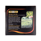 Twinings tea packaging with text and images of a tea field.