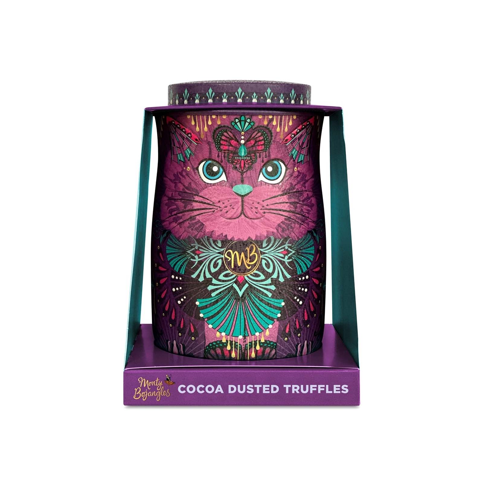 Candle with cat design in a colorful packaging on a white background